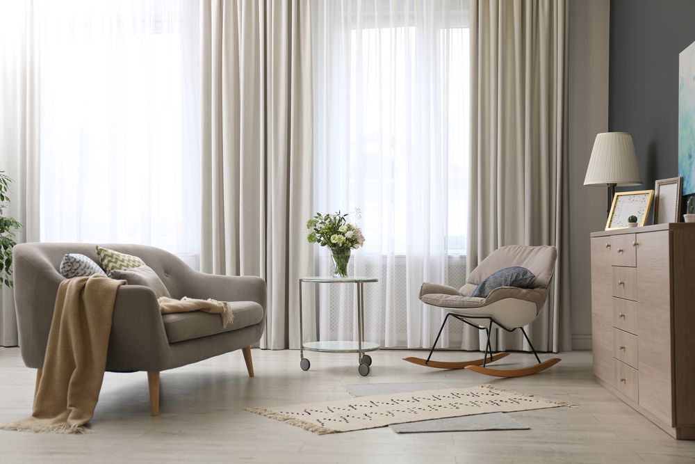 Tips for hanging curtains | New Africa/Shutterstock